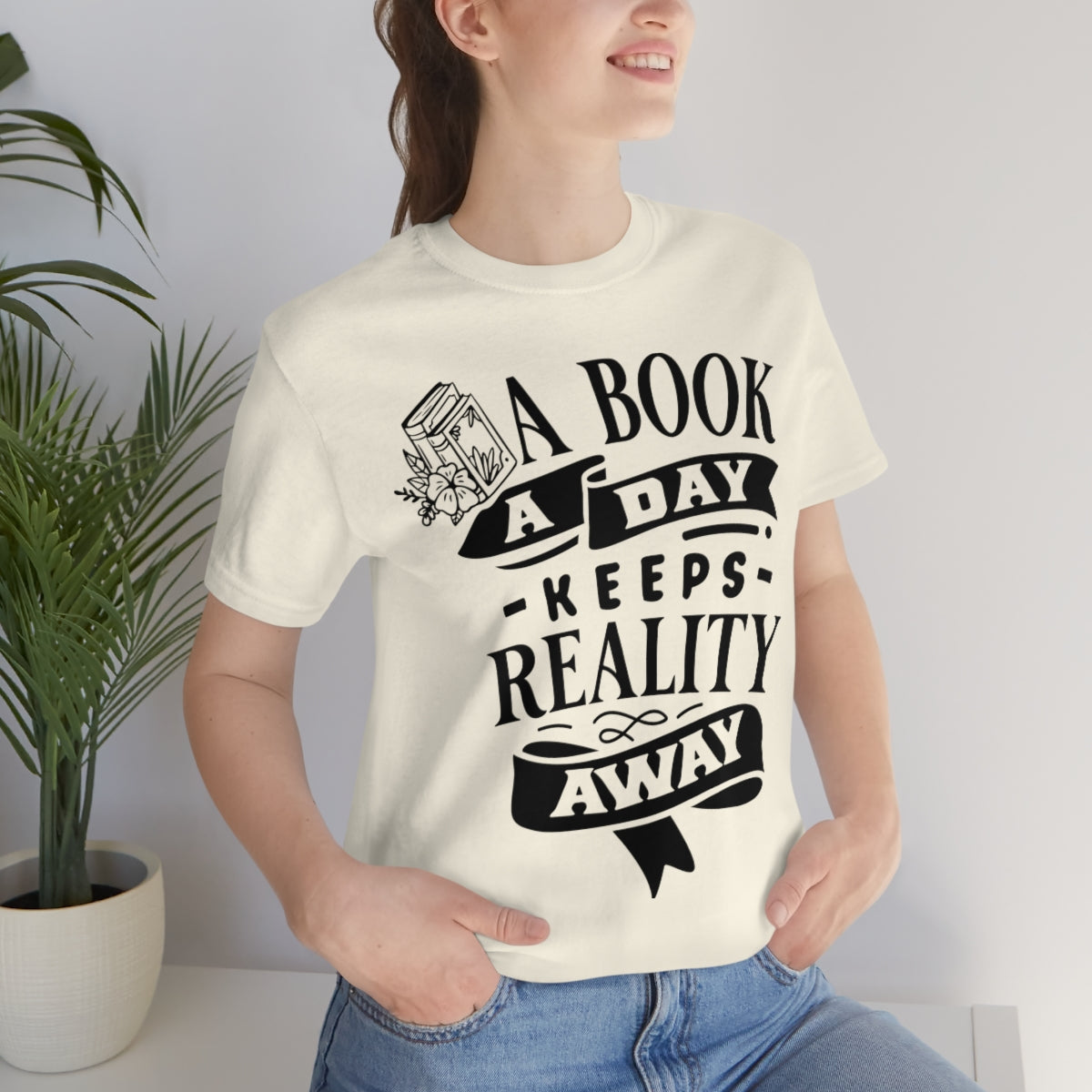 A Book A Day Keeps Reality Away | Unisex Short Sleeve Tee