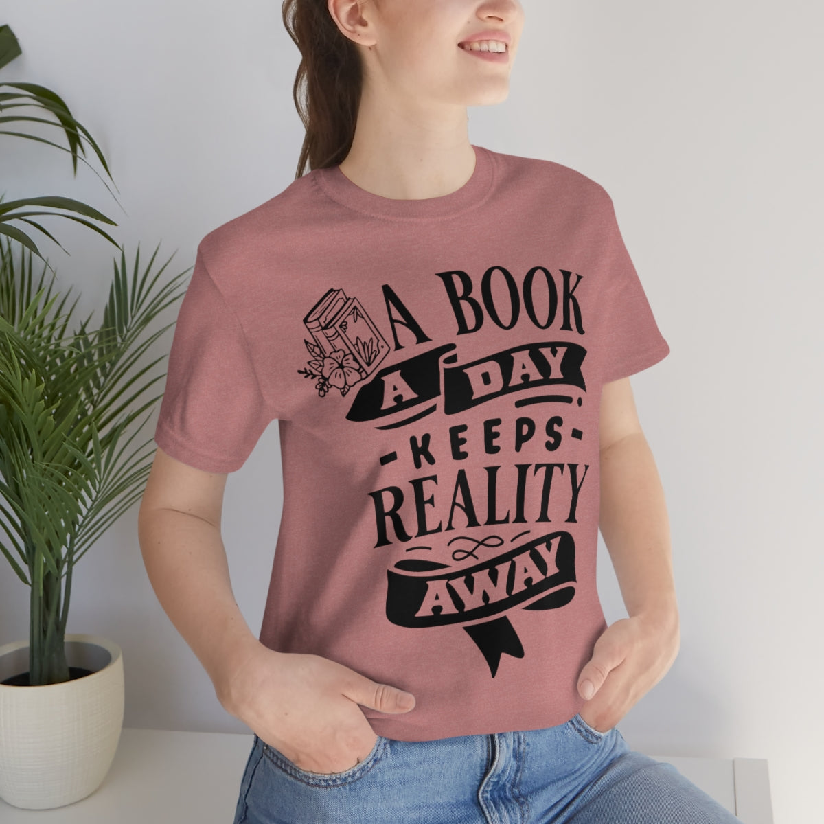 A Book A Day Keeps Reality Away | Unisex Short Sleeve Tee