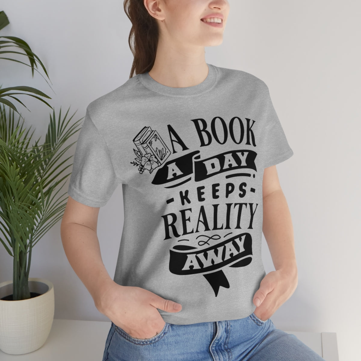 A Book A Day Keeps Reality Away | Unisex Short Sleeve Tee